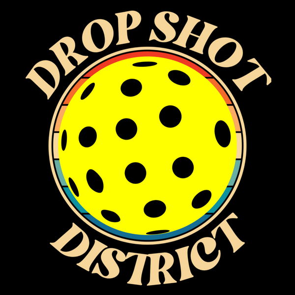 The premier pickleball lifestyle brand, the best pickleball apparel - Drop Shot District - their logo with a pickleball in the middle.
